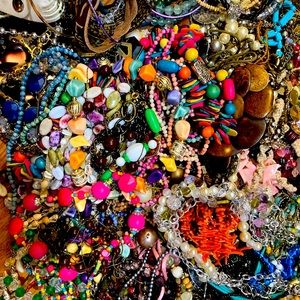 MYSTERY BUNDLE of 20 pieces of wearable costume jewelry.With and without tags!